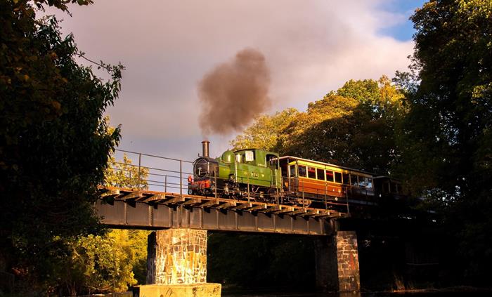 Steaming across Banwy Bridge on a summer's evening in Mid Wales